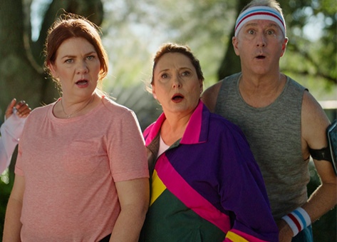 Stopping the neighborhood gossipers in their tracks with Clopay garage doors.